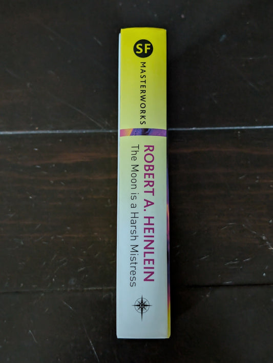 The Moon is a Harsh Mistress by Robert A. Heinlein, Hardcover 2008 -JD